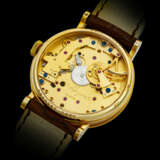 BREGUET. AN 18K GOLD SEMI-SKELETONISED WRISTWATCH WITH POWER RESERVE - фото 2