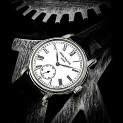 PATEK PHILIPPE. A RARE AND ELEGANT PLATINUM AUTOMATIC MINUTE REPEATING WRISTWATCH WITH ENAMEL DIAL
