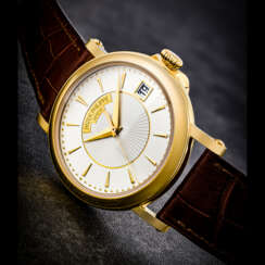 PATEK PHILIPPE. AN 18K GOLD AUTOMATIC WRISTWATCH WITH SWEEP CENTRE SECONDS AND DATE