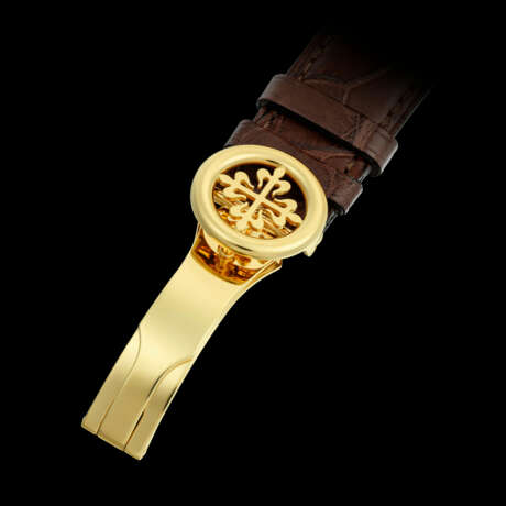 PATEK PHILIPPE. AN 18K GOLD AUTOMATIC WRISTWATCH WITH SWEEP CENTRE SECONDS AND DATE - photo 3