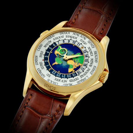 PATEK PHILIPPE. A RARE AND BEAUTIFUL 18K GOLD AUTOMATIC WORLD TIME WRISTWATCH WITH CLOISONN&#201; ENAMEL DIAL - фото 2