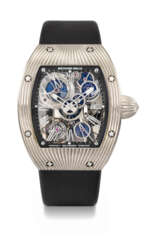 RICHARD MILLE. A UNIQUE 18K WHITE GOLD SKELETONIZED TOURBILLON WRISTWATCH WITH BLUED AND GOLD MINERAL-SET WHEELS AND BOX, MADE TO COMMEMORATE THE 150TH ANNIVERSARY OF BOUCHERON