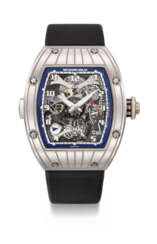 RICHARD MILLE. AN EXTREMELY RARE PLATINUM DUAL TIME TOURBILLON WRISTWATCH WITH POWER RESERVE AND GUARANTEE