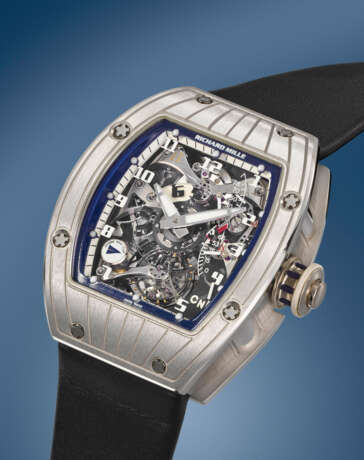RICHARD MILLE. AN EXTREMELY RARE PLATINUM DUAL TIME TOURBILLON WRISTWATCH WITH POWER RESERVE AND GUARANTEE - фото 2