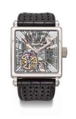 ROGER DUBUIS. A RARE AND LARGE TITANIUM LIMITED EDITION SKELETONIZED WRISTWATCH WITH FLYING TOURBILLON, GUARANTEE AND BOX