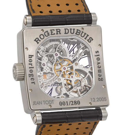 ROGER DUBUIS. A RARE AND LARGE TITANIUM LIMITED EDITION SKELETONIZED WRISTWATCH WITH FLYING TOURBILLON, GUARANTEE AND BOX - photo 3