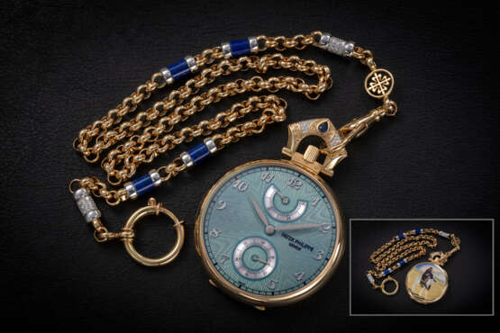 PATEK PHILIPPE, REF. 982/104J-001 TUAREG AND DROMEDARY, A UNIQUE GOLD ENGRAVED AND ENAMELED OPEN-FACED POCKET WATCH - Foto 1