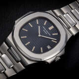 PATEK PHILIPPE, NAUTILUS REF. 3700A, AN ICONIC AND ATTRACTIVE STEEL WRISTWATCH - фото 2