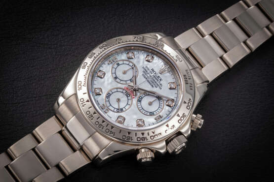 ROLEX, DAYTONA REF. 116509, A GOLD AUTOMATIC CHRONOGRAPH WRISTWATCH WITH MOTHER-OF-PEARL DIAL - Foto 1
