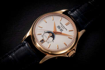 PATEK PHILIPPE, REF. 5125R-010 W125, A LIMITED EDITION GOLD AUTOMATIC ANNUAL CALENDAR WRISTWATCH