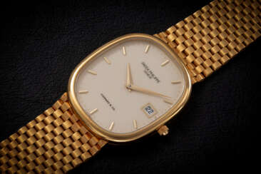 PATEK PHILIPPE, ELLIPSE ‘JUMBO’ REF. 3747/1, A GOLD QUARTZ WRISTWATCH RETAILED BY TIFFANY & CO. 