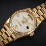 ROLEX, DAY-DATE REF. 18238, A GOLD AUTOMATIC WRISTWATCH WITH CACHOLONG DIAL - photo 1