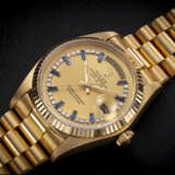ROLEX, DAY-DATE REF. 18038, A GOLD AUTOMATIC WRISTWATCH WITH DIAMOND AND SAPPHIRE-SET DIAL - photo 1