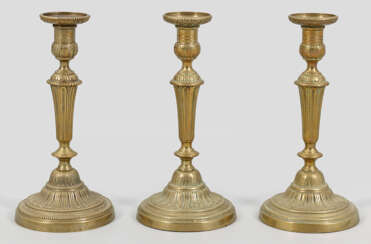 Drei Tafelleuchter im Louis-XVI-Stil