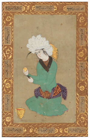 A KNEELING YOUTH HOLDING A CUP - photo 1