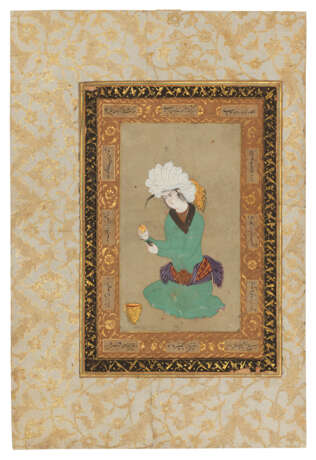 A KNEELING YOUTH HOLDING A CUP - photo 2