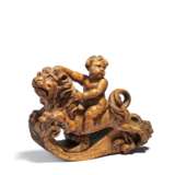 Small putto riding on lion - photo 1