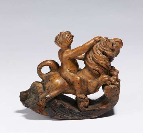 Small putto riding on lion - photo 2