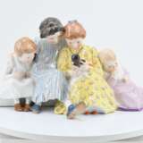 Four children with doll - Foto 2