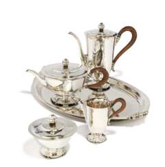 Five piece coffee and tea set with martellé surface