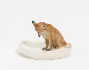Little fox on bowl