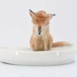 Little fox on bowl - photo 2
