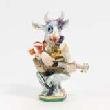 Guitar player with bull mask - photo 1