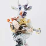 Guitar player with bull mask - photo 2