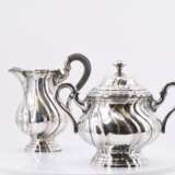 Four piece coffee and tea set with twisted contours and tray - photo 4