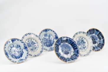 Three pairs of plates with different blue decors