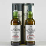 Laphroaig 10 Year Old Cask Strength Batch 003Bottled Jan 2011. 55.3% vol. In original stained coffret. Excellent appearance (1)Laphroaig 10 Year Old Original Cask Strength55.7% vol. In original stained coffret. Slightly bin soiled front and back labels - photo 4