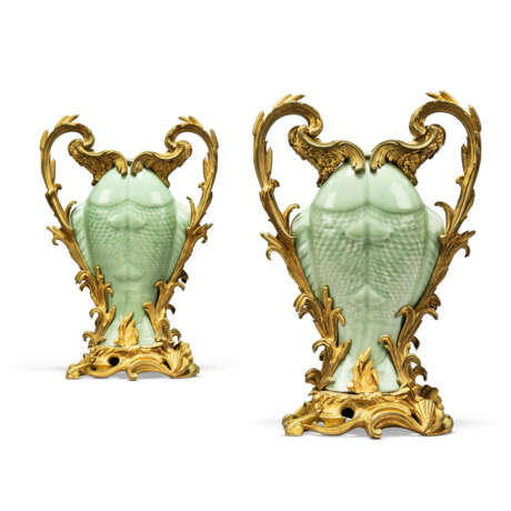 A PAIR OF LOUIS XV-STYLE ORMOLU-MOUNTED CHINESE MOULDED CELADON-GLAZED TWIN-FISH VASES - фото 1