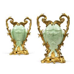 A PAIR OF LOUIS XV-STYLE ORMOLU-MOUNTED CHINESE MOULDED CELADON-GLAZED TWIN-FISH VASES