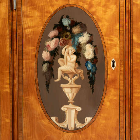 A GEORGE III POLYCHROME-PAINTED, PARCEL-GILT SATINWOOD, KINGWOOD AND TULIPWOOD-CROSSBANDED COMMODE - photo 2