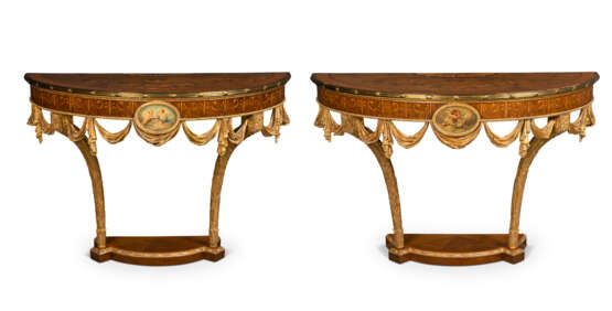 A PAIR OF GEORGE III GILT-BRASS MOUNTED HAREWOOD, SATINWOOD, AMARANTH, FRUITWOOD MARQUETRY, PAINTED AND GILTWOOD DEMI-LUNE CONSOLE TABLES - photo 1