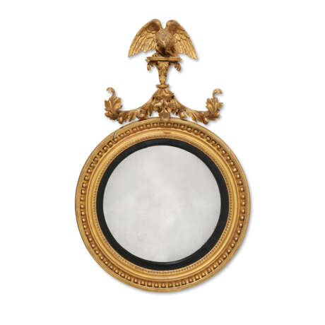 A REGENCY GILTWOOD AND EBONISED CONVEX MIRROR - photo 1