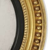 A REGENCY GILTWOOD AND EBONISED CONVEX MIRROR - photo 3