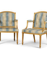 A PAIR OF GEORGE III GILTWOOD ARMCHAIRS