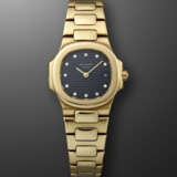 PATEK PHILIPPE, YELLOW GOLD AND DIAMOND-SET 'LADY NAUTILUS', REF. 4700 - photo 1