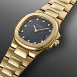 PATEK PHILIPPE, YELLOW GOLD AND DIAMOND-SET 'LADY NAUTILUS', REF. 4700 - photo 2