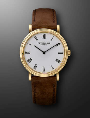 PATEK PHILIPPE, YELLOW GOLD CALATRAVA 'CLOU DE PARIS', REF. 3992 - Foto 1