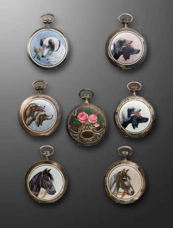 A GROUP OF SEVEN SILVER AND ENAMEL POCKET WATCHES - фото 1