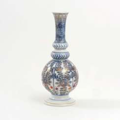 Kalebassenvase mit Indianischen Blumen.