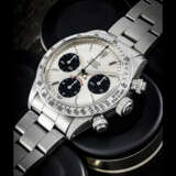 ROLEX. A STAINLESS STEEL CHRONOGRAPH WRISTWATCH WITH BRACELET - photo 1