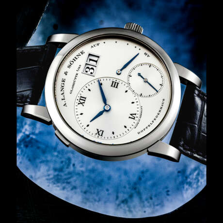 A. LANGE & S&#214;HNE. A VERY RARE 18K WHITE GOLD WRISTWATCH WITH OVERSIZED DATE, POWER RESERVE INDICATION AND BLUED HANDS - фото 1