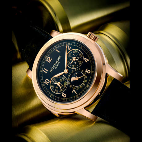PATEK PHILIPPE. A RARE 18K PINK GOLD AUTOMATIC “CATHEDRAL” MINUTE REPEATING PERPETUAL CALENDAR WRISTWATCH WITH MOON PHASES, 24 HOUR AND LEAP YEAR INDICATION - photo 1