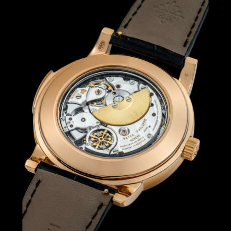 PATEK PHILIPPE. A RARE 18K PINK GOLD AUTOMATIC “CATHEDRAL” MINUTE REPEATING PERPETUAL CALENDAR WRISTWATCH WITH MOON PHASES, 24 HOUR AND LEAP YEAR INDICATION - photo 3