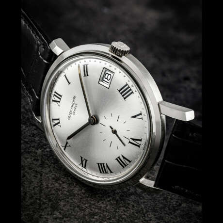 PATEK PHILIPPE. A RARE 18K WHITE GOLD AUTOMATIC WRISTWATCH WITH ROMAN NUMERALS AND DATE - photo 1