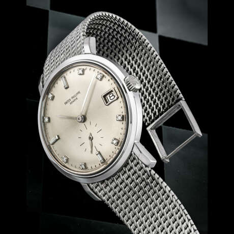 PATEK PHILIPPE. A VERY RARE 18K WHITE GOLD AND DIAMOND-SET AUTOMATIC WRISTWATCH WITH DATE AND BRACELET - photo 1