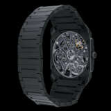 BVLGARI. AN EXTRA THIN BLACK CERAMIC SKELETONISED WRISTWATCH WITH POWER RESERVE AND BRACELET - photo 2